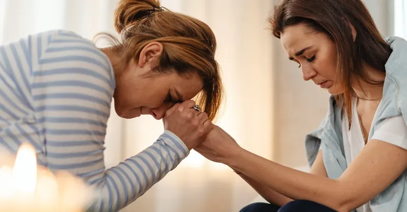 Mother and daughter sharing a heartfelt moment, supporting each other through emotional times.